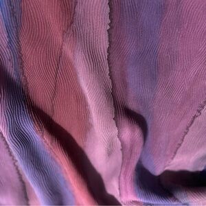 Gorgeous textured silk scarf in purple/deep blue hues signed by artist. 80”x21”